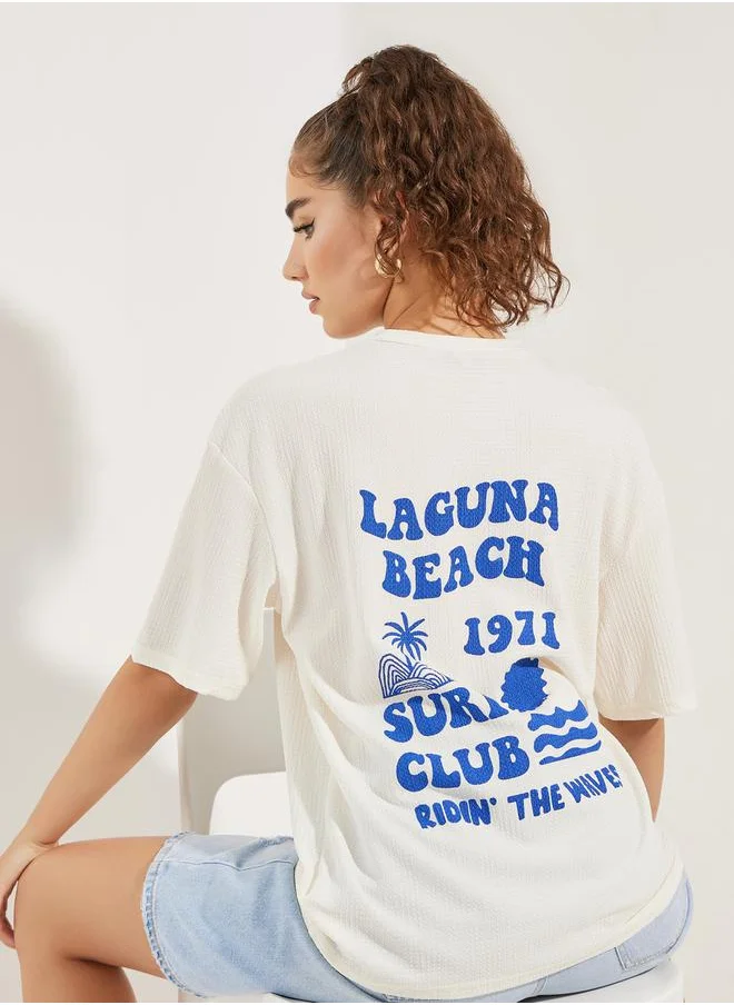 ستايلي Oversized Laguna Beach Graphic Print T-Shirt