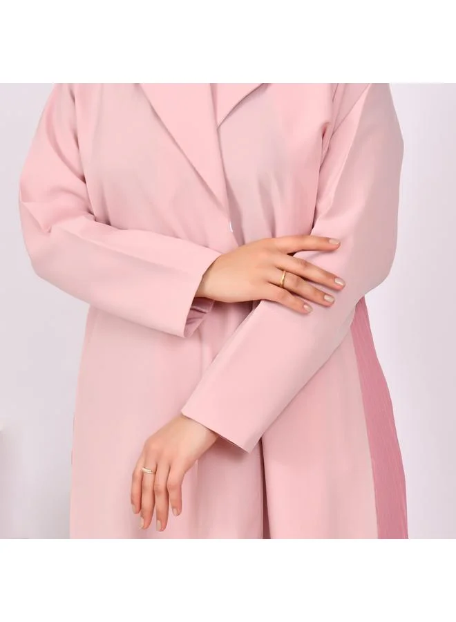 HAWRAA ABAYA Light pink blazer abaya with dark pink overlay and pleats at the bottom of the abaya