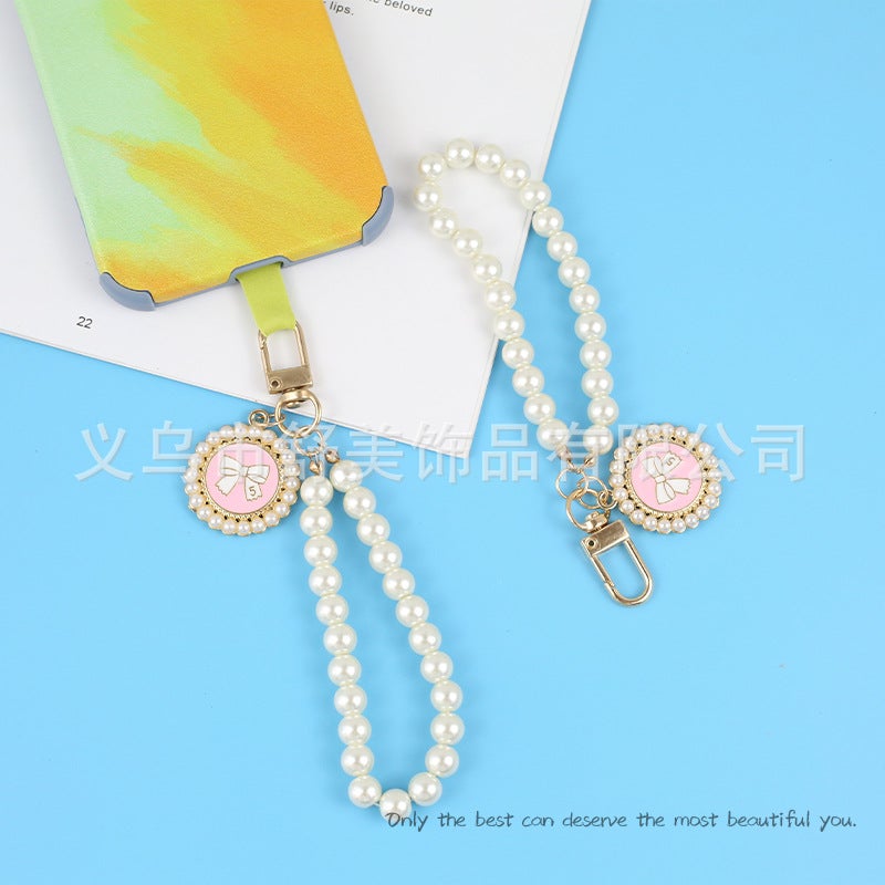 New Pearl Car Keychain Pendant Creative Bow Pearl Round Brand Accessories سماعة أذن مجموعة ديكور حقيبة النساء - Image 5