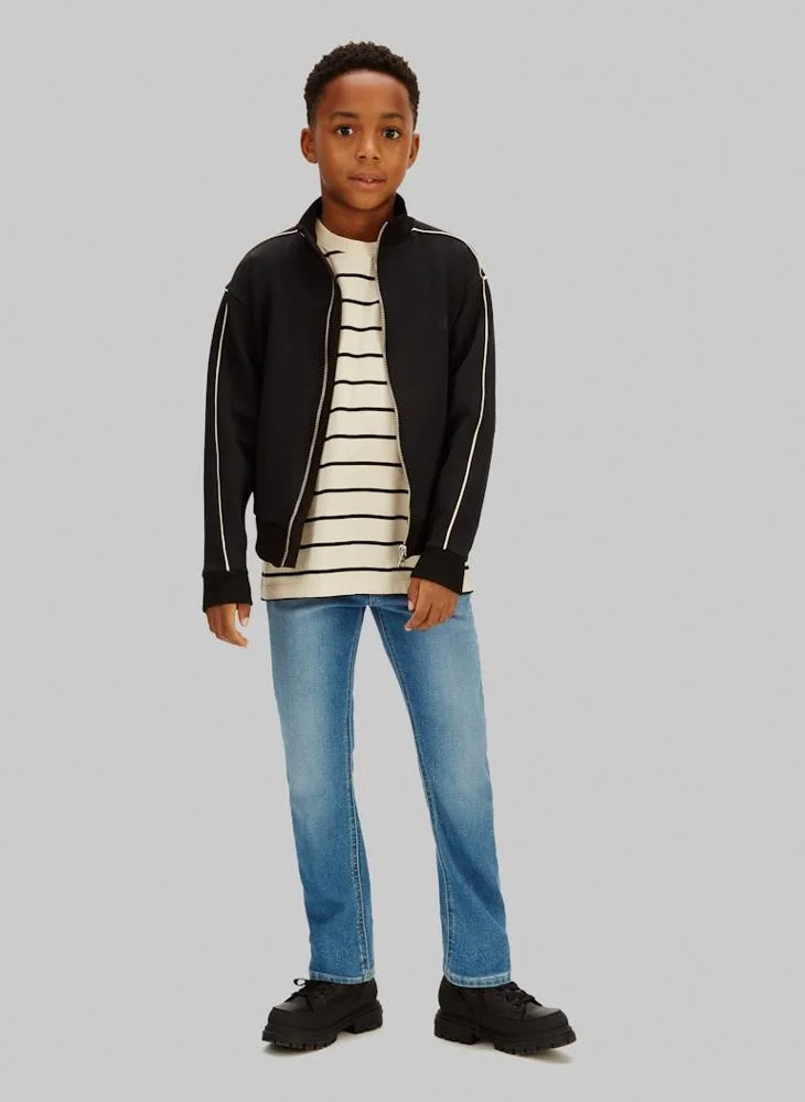 Calvin Klein Jeans Essential Washed Blue Youth Slim Fit Jeans for Men | Best Price UAE