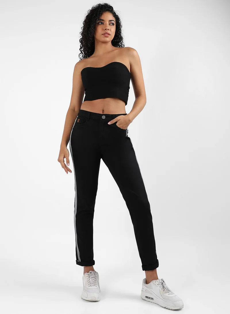 Campus Sutra Campus Sutra Women's Classic Black Dark-Washed Side-Striped Skinny Fit Denim Jeans | Stretchable Cotton Mid-Rise Crafted With Comfort Fit and High Performance For Everyday Wear