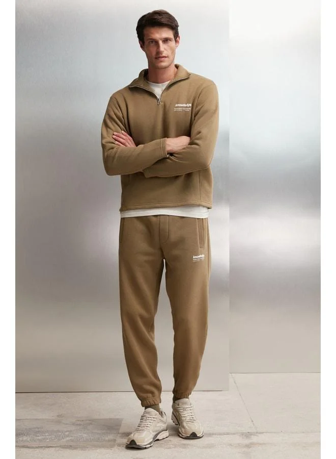 GRIMELANGE Halden Men's fleece-lined stand collar half‑zip sweatshirt with printed details in regular khaki.