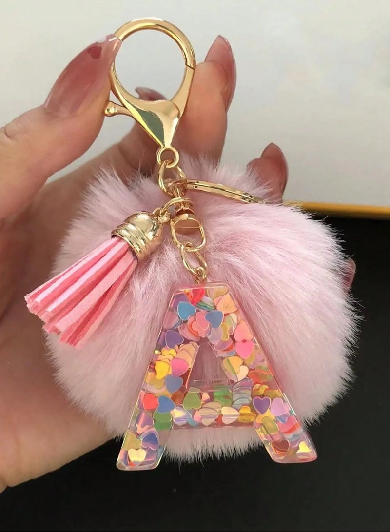Keychain with Letter (A) Design A stylish keychain featuring the letter (A), adorned with a soft fur pom-pom and heart charms. Can be used as a key holder or a decorative accessory for bags.