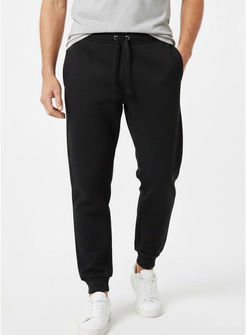 Iron Mountain Men’s Jogger Pants – Cotton Blend Regular Fit Drawstring Trousers in Black - Image 1