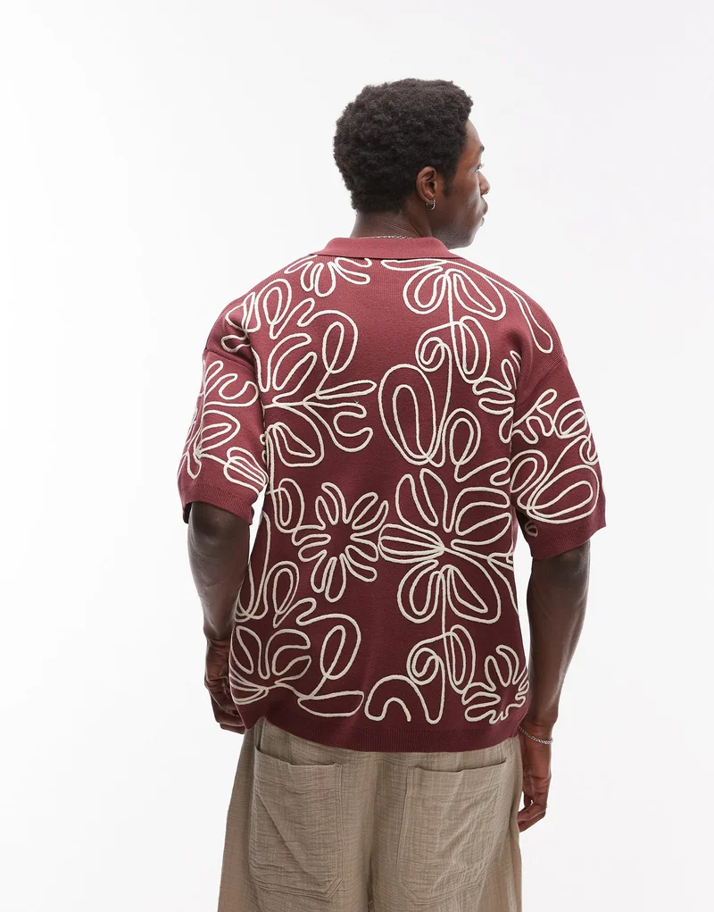 توب مان قميص توب مان مطرز بالزهور الثقيلة بقصة مريحة باللون بي