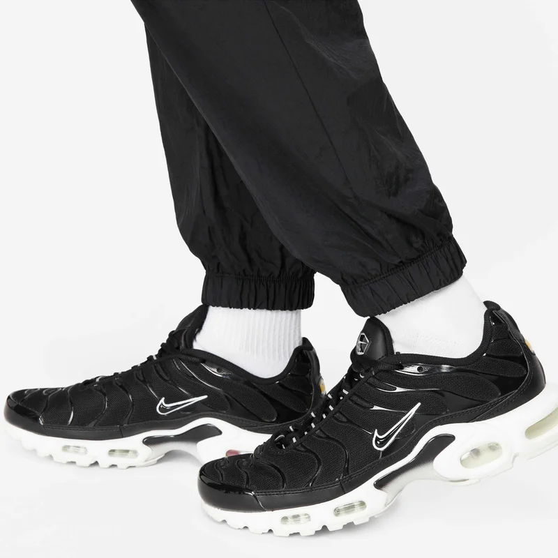 Nike black Women's Sportswear Essential Easy Woven Sweatpants for Women | Best Price UAE