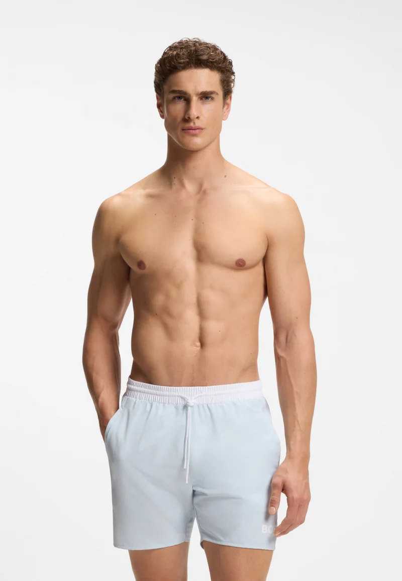 Swim shorts with contrast logo and piping