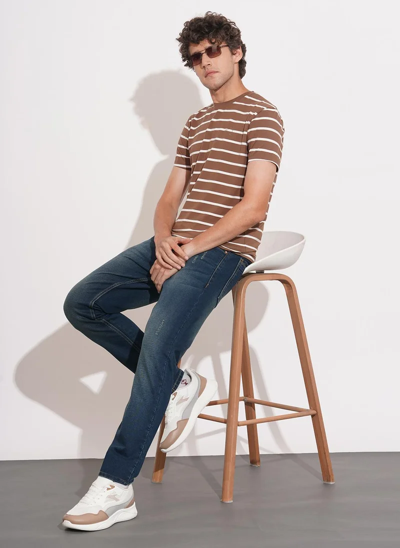 Being Human DARK TONE Men Slim Fit Mid-Rise Mildly Distressed Light Fade Jeans for Men | Best Price UAE