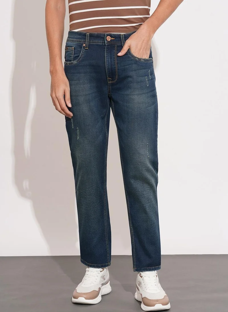 Men Slim Fit Mid-Rise Mildly Distressed Light Fade Jeans