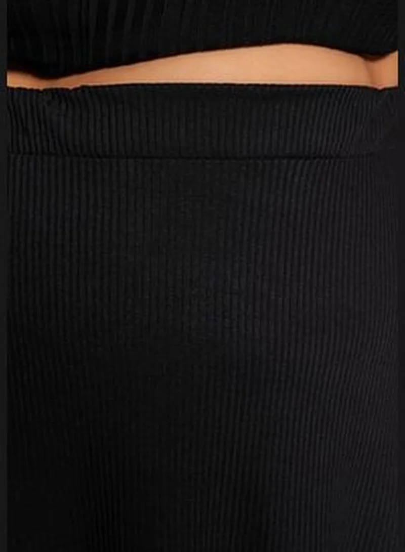 trendyol Black Asymmetrical Knitted Skirt TBBSS22ET0253