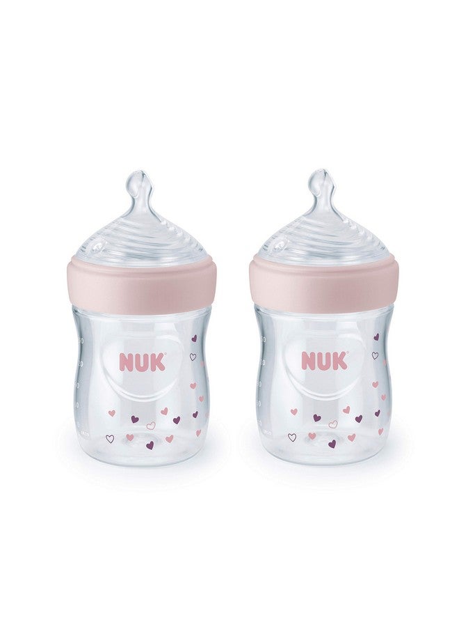 NUK زجاجات رضّع طبيعية بسيطة 5 أونص 2 حزمة الألوان قد تختلف - Image 3