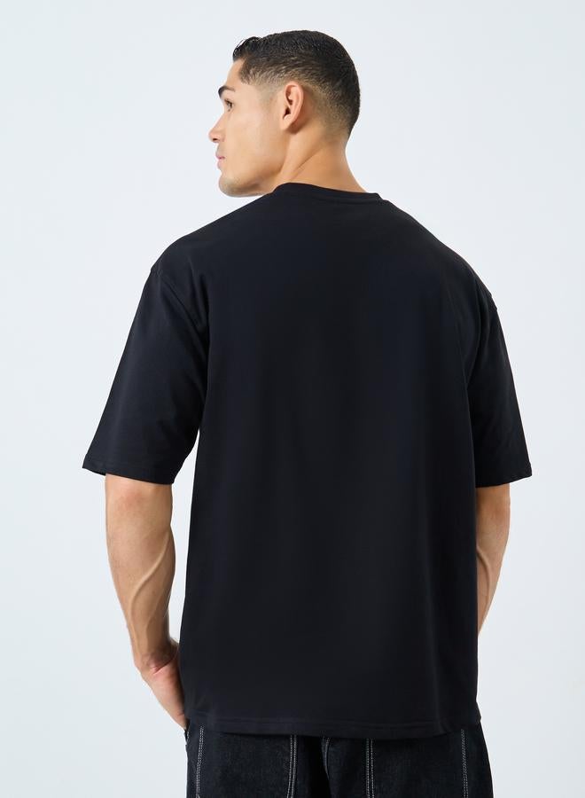 Styli Men Black Oversized Embossed Print T-Shirt - Image 4