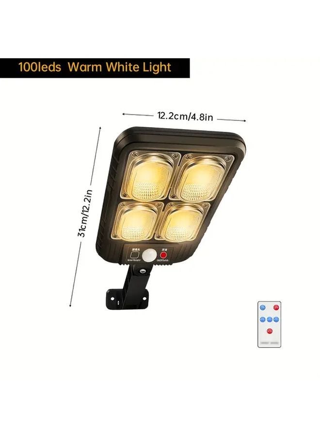 1Pcs 100 LED Solar Motion Sensor Outdoor Wall Lights Warm White IP65 Waterproof - Image 1