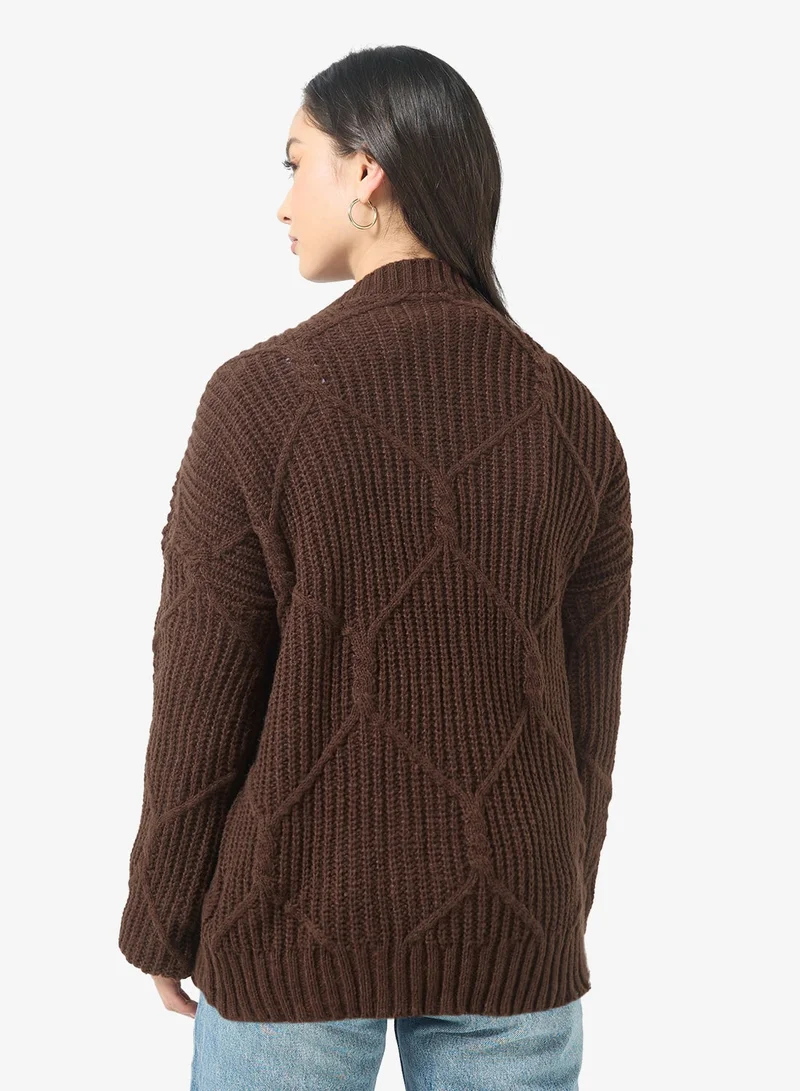 جينجر كنزة محبوكة مضلعة