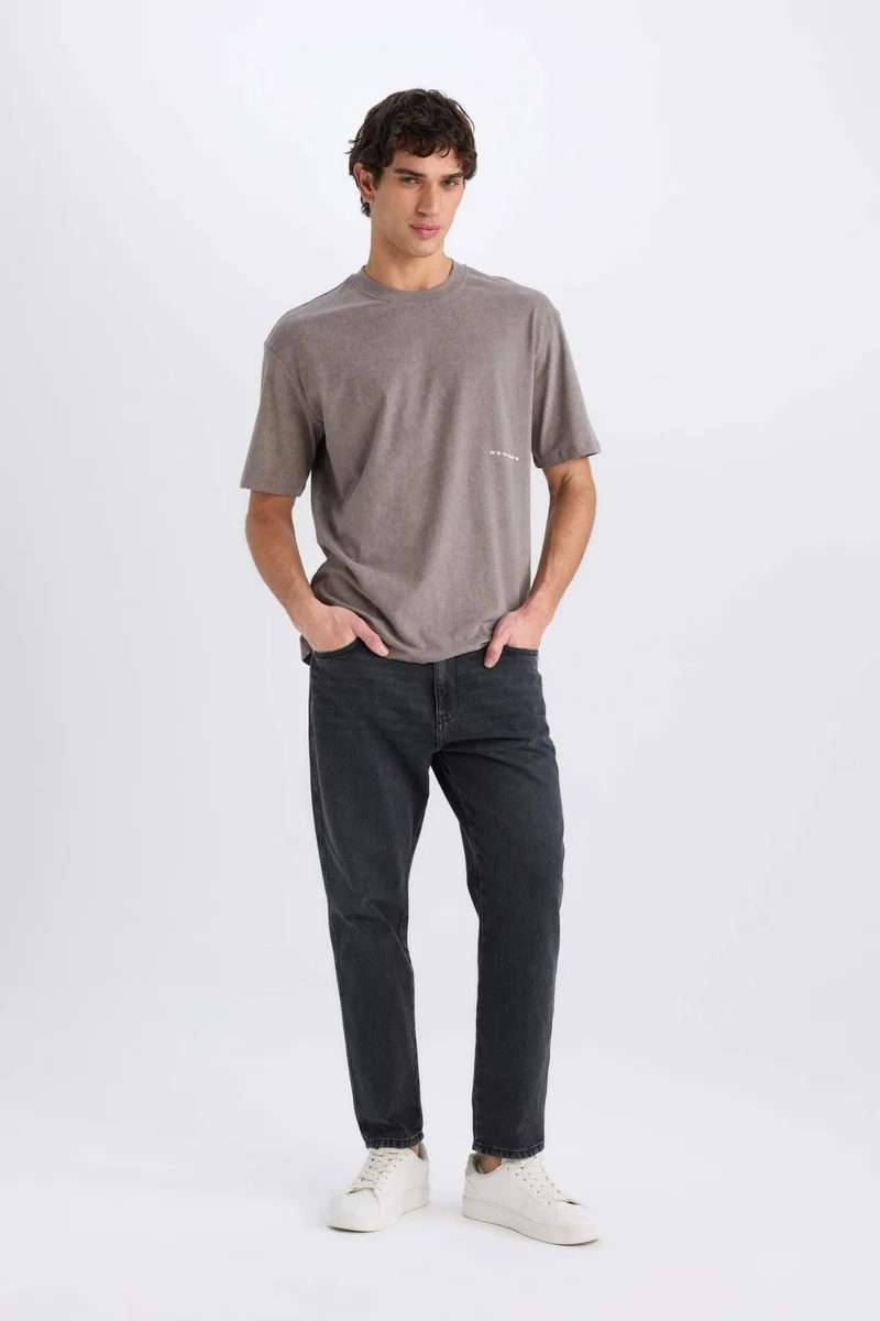 ديفاكتو Boxy Fit Crew Neck Printed Short Sleeve T-Shirt