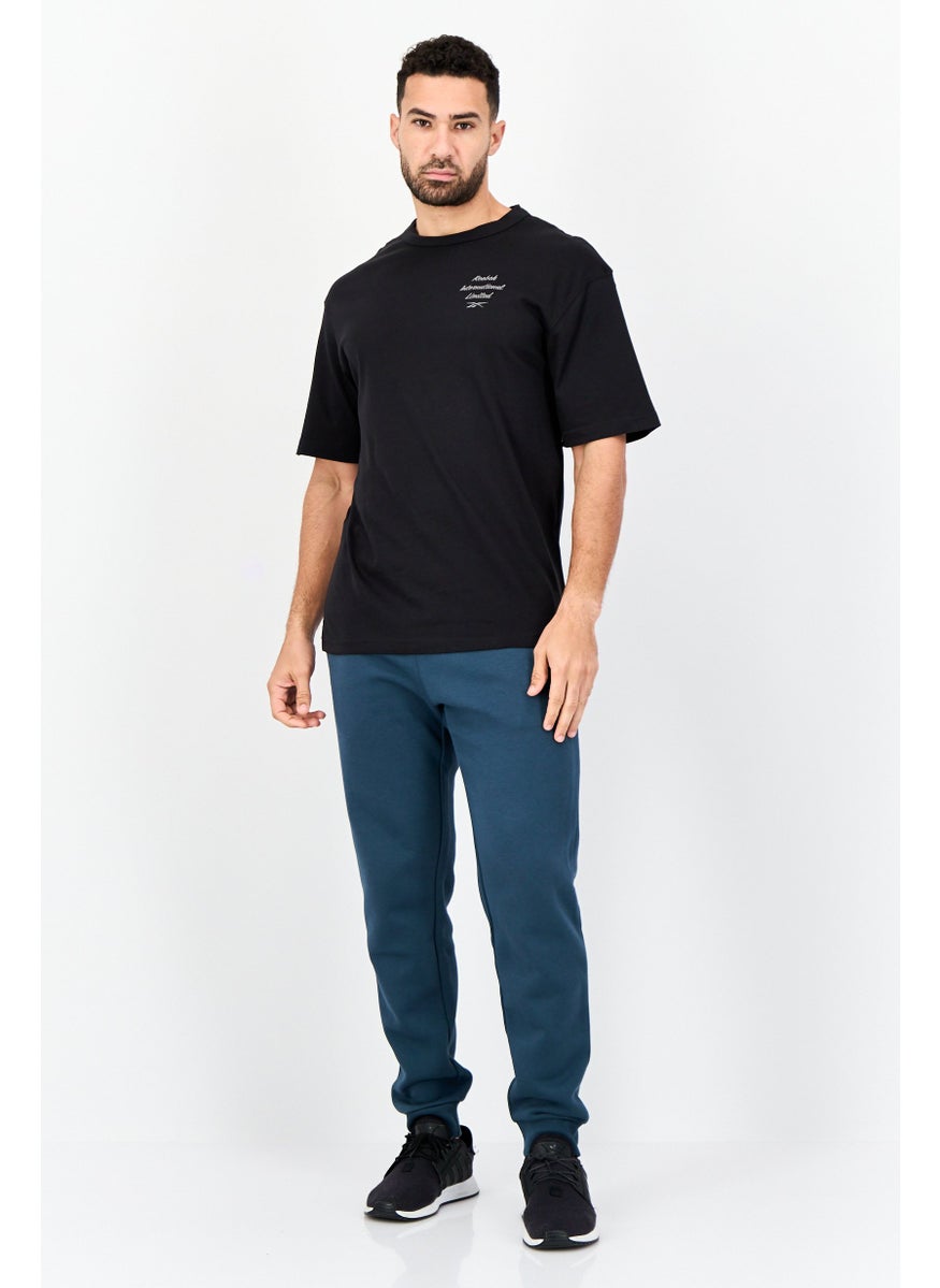 Reebok Men Sportswear Fit Short Sleeve Outdoor T-Shirt, Black  - Image 3