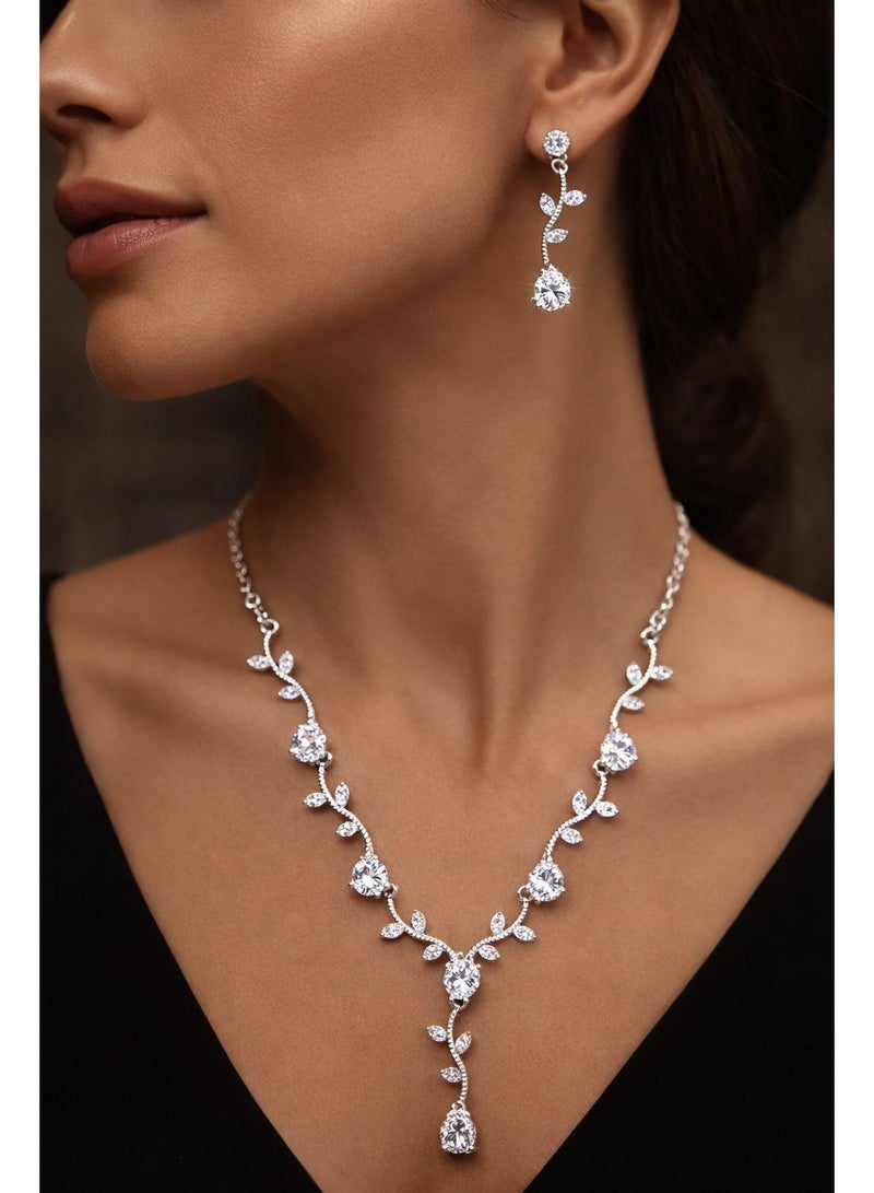 ثري دايموندز طقم سلسلة وحلق مطلي بلاتين وروديوم بفصوص كيوبيك زركونيا - Image 2