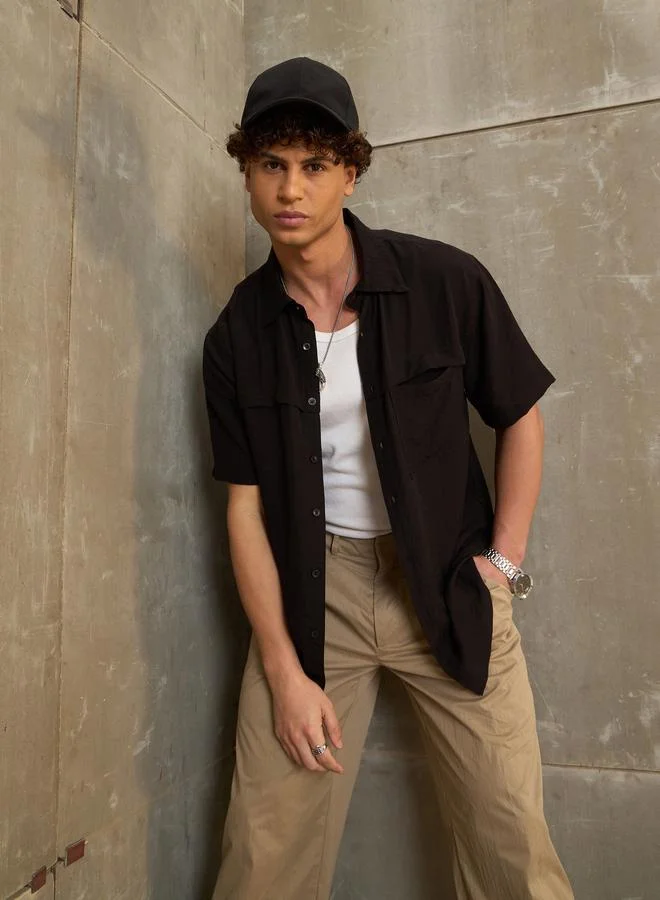 ساسافراس قميص رجالي أسود بقصة مريحة من ساسافراس