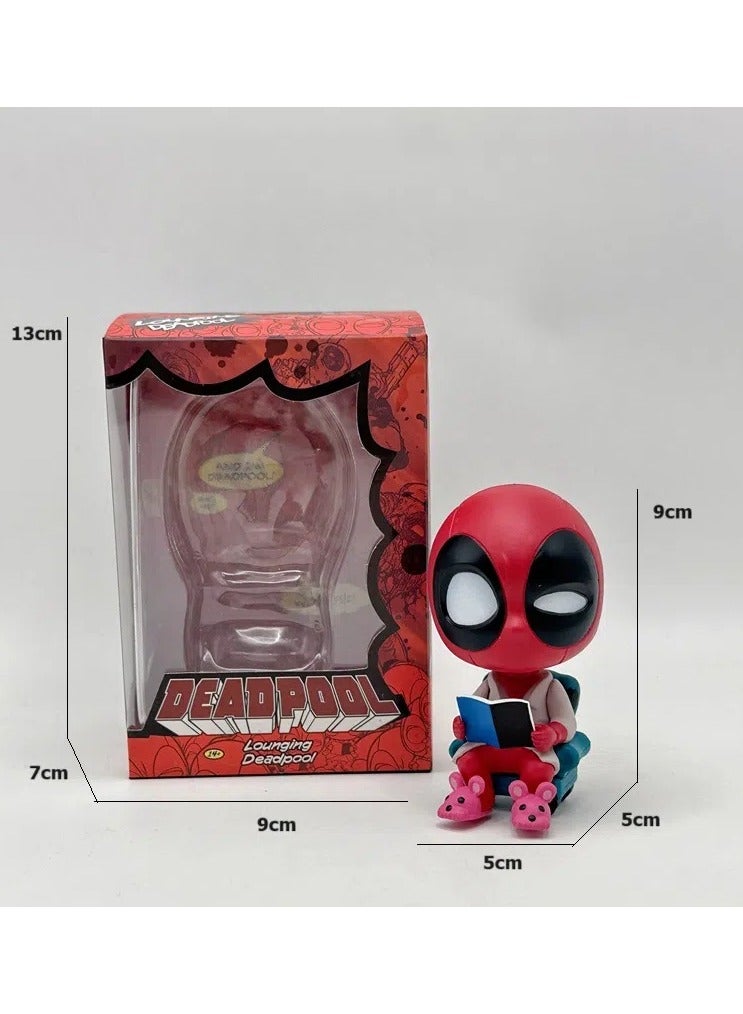 عام النسخة "Q" من دمى ديدبول التي تتأرجح رأسها، وهي تعتبر زخارف لتزيين داخلية السيارات أو زخارف لخبز الكعكات، تمت إستعادةها بشكل جميل. - Image 3