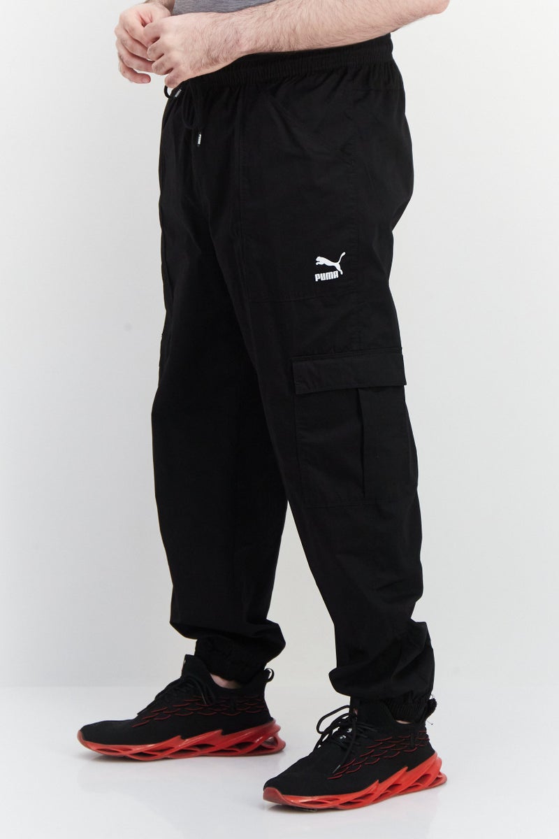 PUMA Men Sportswear Fit Brand Logo Track Pants, Black - Image 4