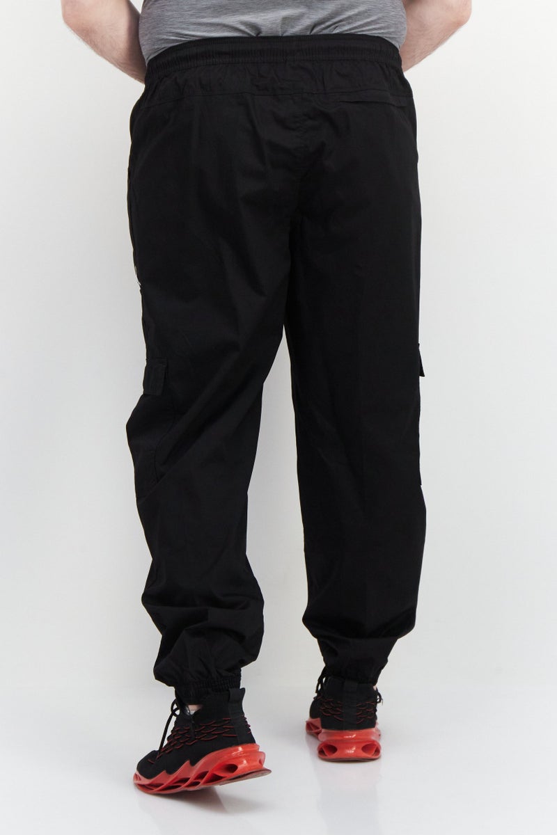 PUMA Men Sportswear Fit Brand Logo Track Pants, Black - Image 3