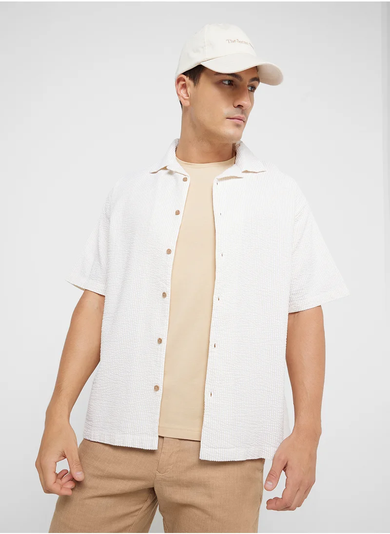 ريبلز مع نمشي MEN'S OVERSIZED SHIRT