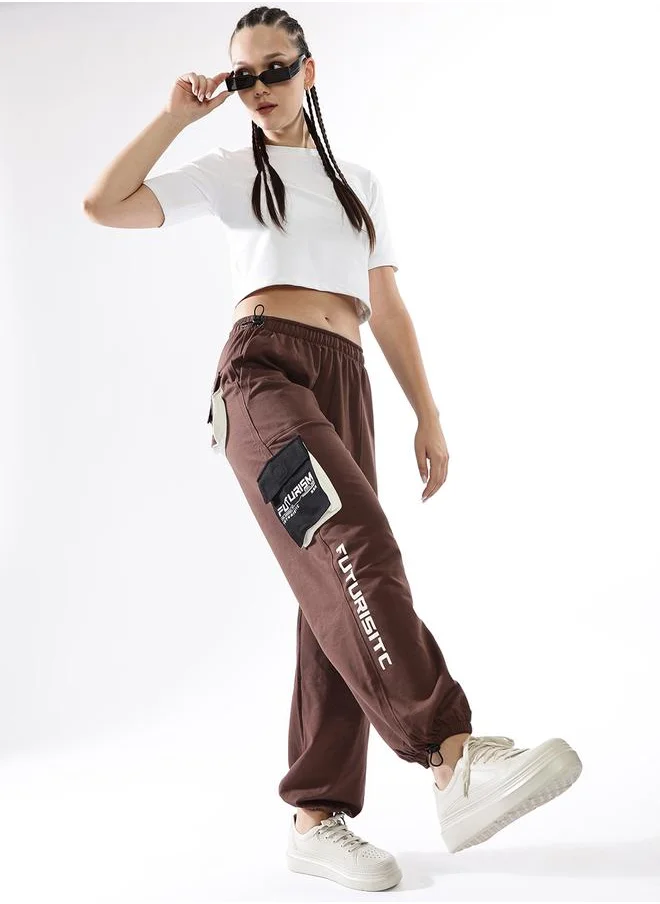 هوبرهولمي Women Track Pants in Multicolor featuring Jogger fit with a printed pattern, no sleeves, regular length, secured with elasicated + drawstring closure, crafted from terry – a must-have for those who love trendy fashion.