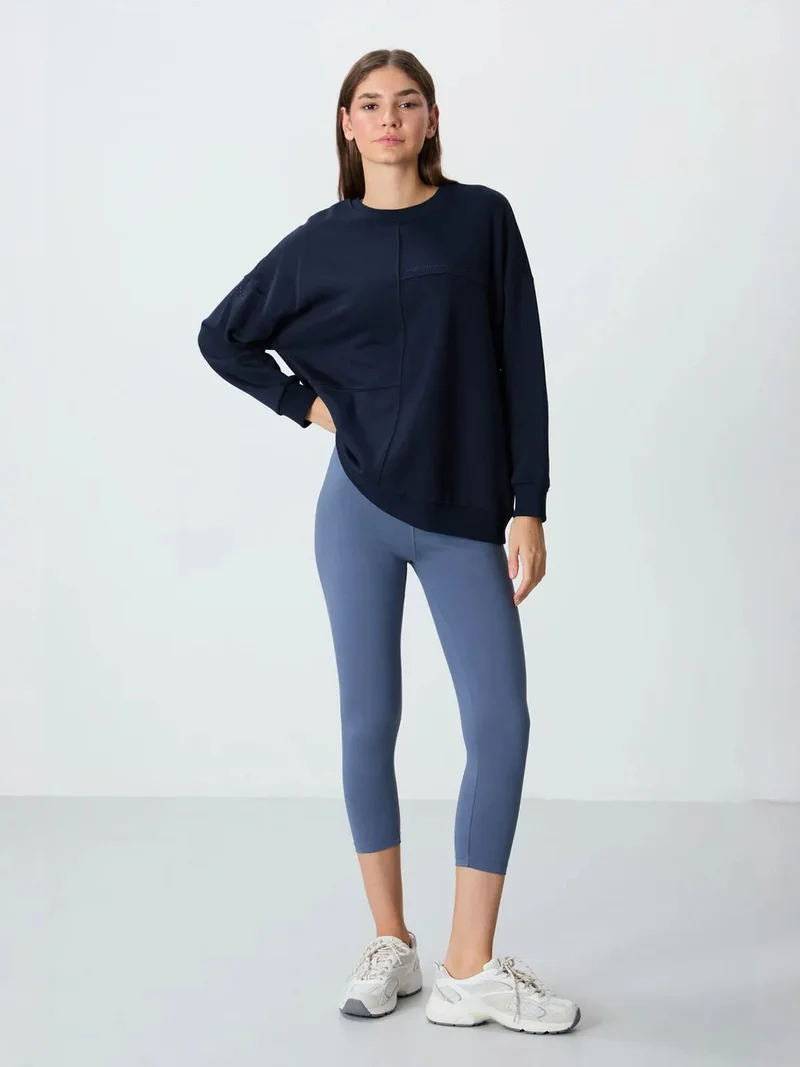 تومي لايف TOMMY High-Waist Capri Leggings