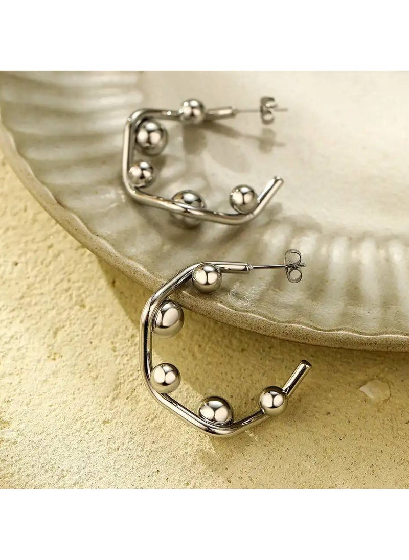 FLUFFY Geometric Silver earrings with striking designs, adding a modern and stylish touch to any look  - Image 1