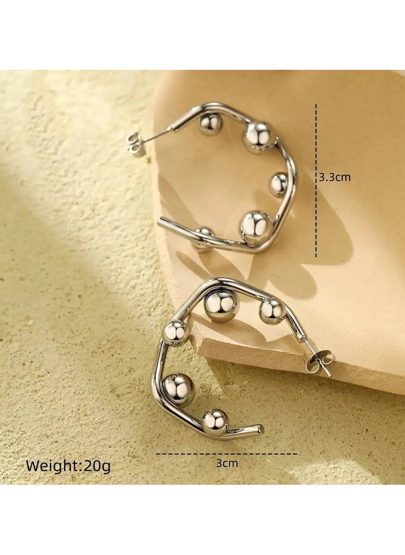 FLUFFY Geometric Silver earrings with striking designs, adding a modern and stylish touch to any look  - Image 2