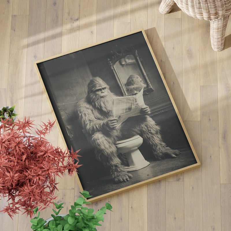 TNESSENTIAL Funny Bigfoot Bathroom Wall Art Poster or Canvas Print, Sasquatch on Toilet Reading Newspaper, Retro Cabin or Lake House Decor, Hunting Gift - Image 1