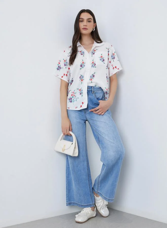 تايك تو بلوزة بطبعة زهور بأكمام قصيرة