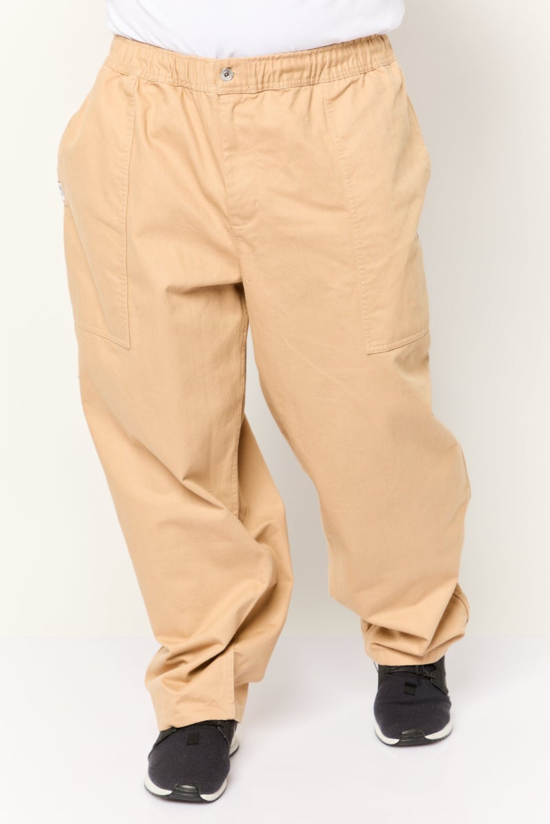 PUMA Men Sportswear Fit Solid Chino Pants, Tan - Image 1