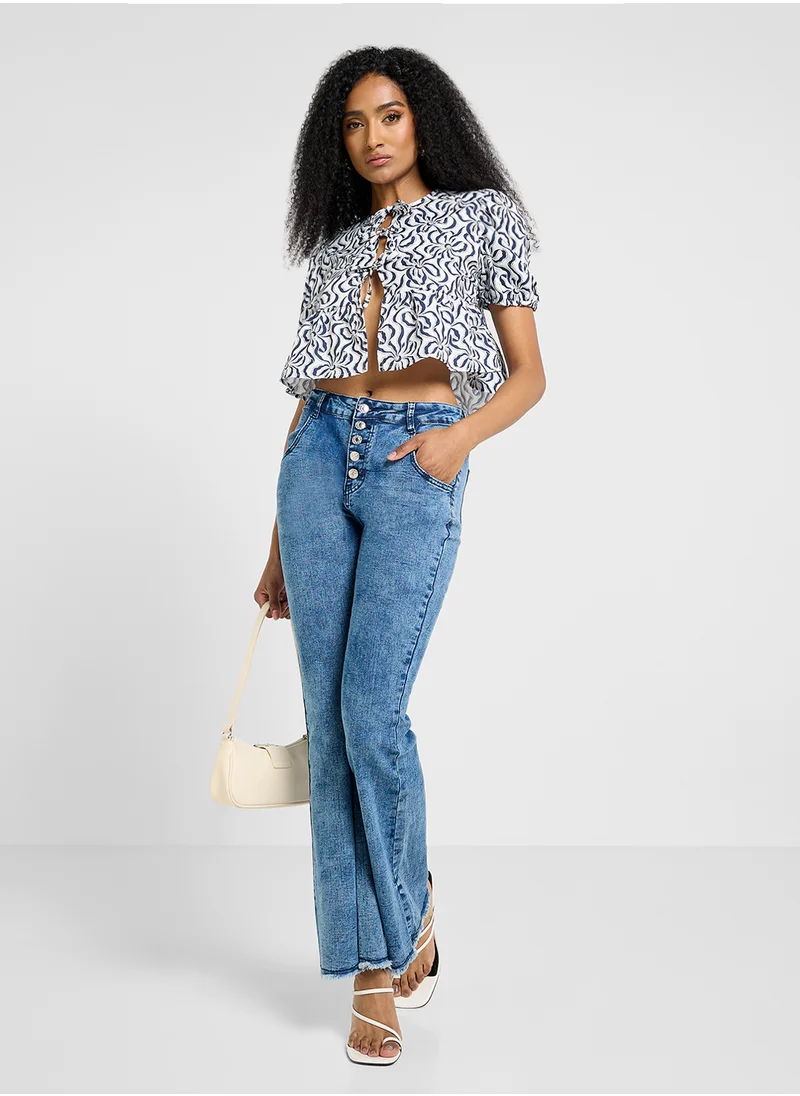 جينجر Puff Sleeve Printed Tie Up Peplum Blouse