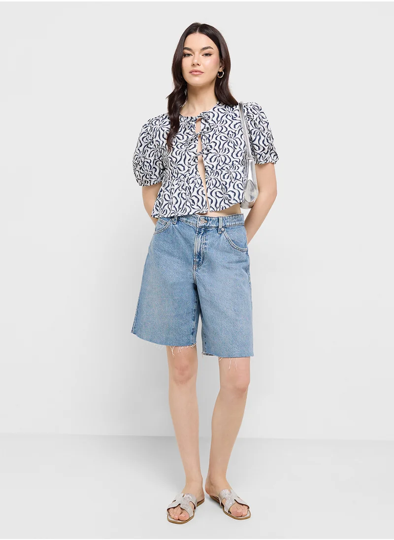 Ginger Puff Sleeve Printed Tie Up Peplum Blouse