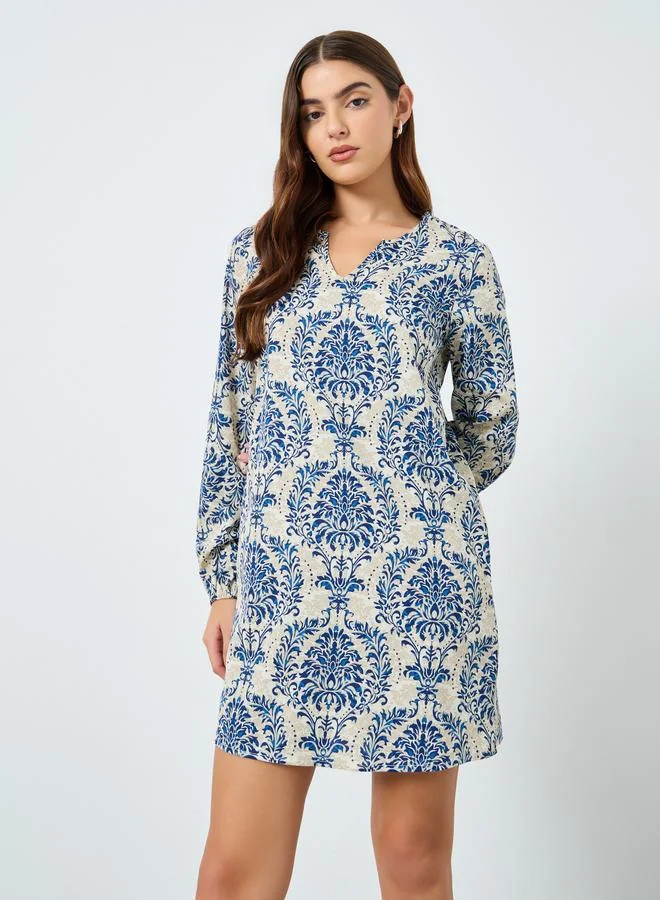 Take Two Graphic Print Long Sleeve Mini Dress