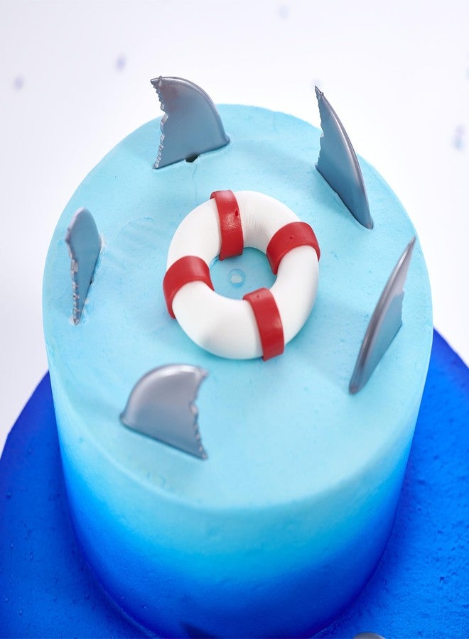 ديكوباك أعواد تزيين الكيك على شكل زعانف القرش من ديكوباك، عبوة من 24 قطعة، لتزيين الكب كيك، زينة قابلة لإعادة الاستخدام للكيك والكب كيك والمخبوزات الأخرى، مثالية لحفلات الشاطئ وحفلات المسبح. - Image 4