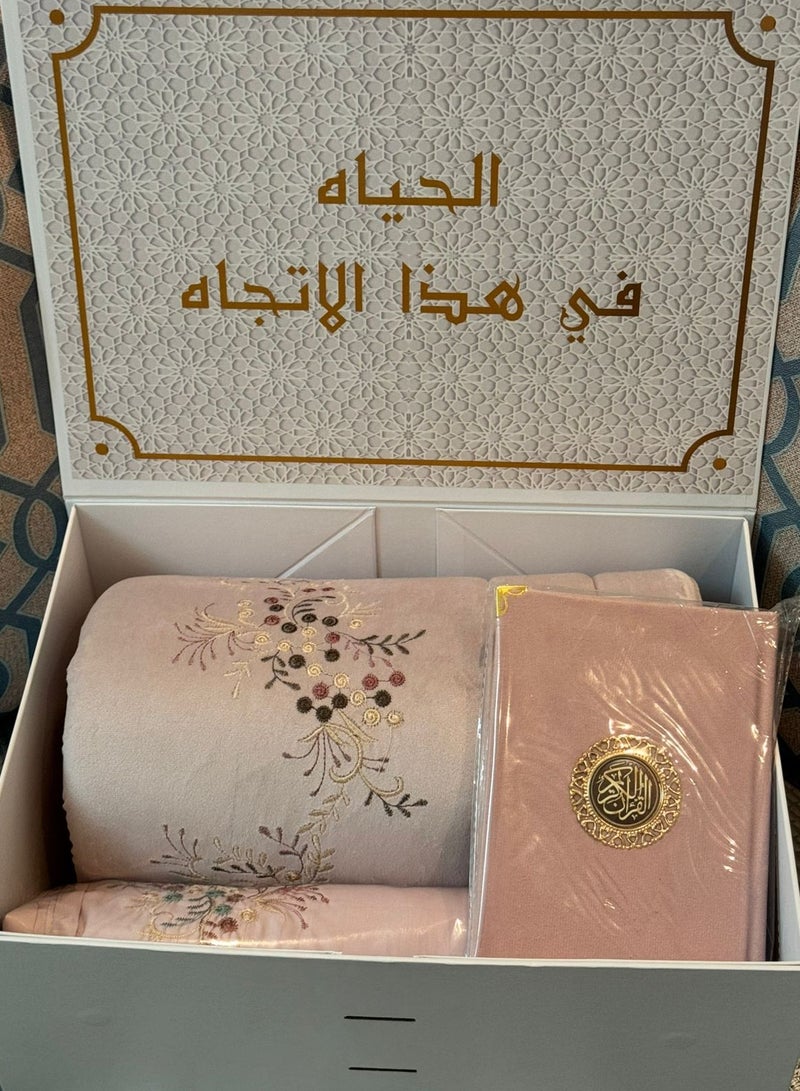 A prayer rug set consisting of 3 pieces, a quilted prayer rug + an embroidered prayer sheet + a Qur’an