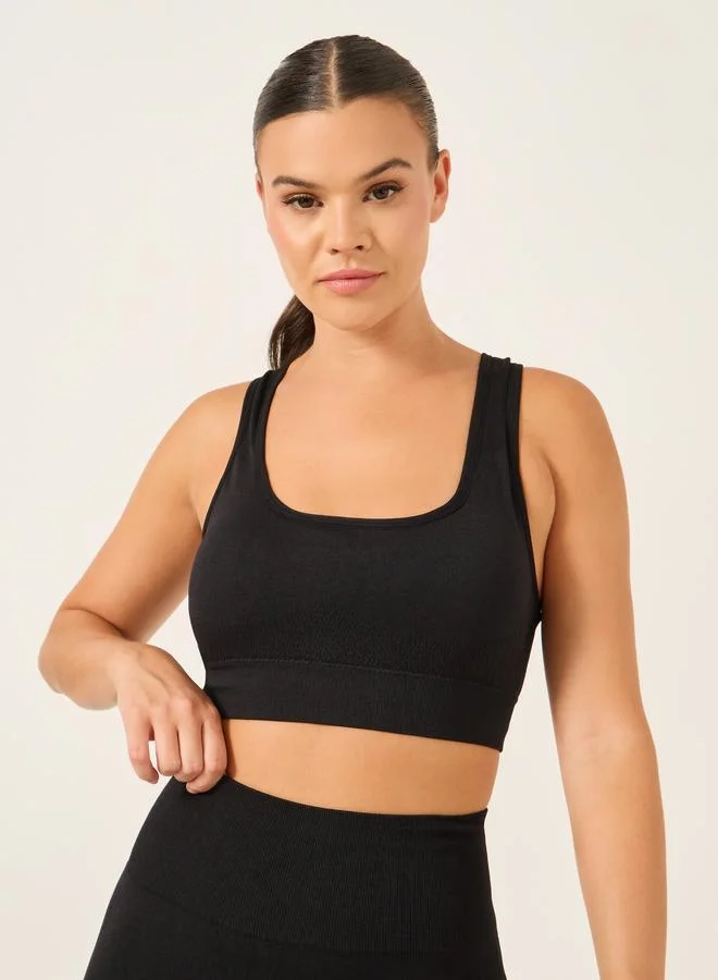 ستايلي اكتيف طقم حمالة صدر رياضية بدون خياطة بفتحة دمعة من الخلف وسروال ضيق جاكار