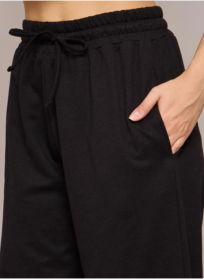 ساسافراس Solid Terry Baggy Joggers with Elasticated Waist by Styli