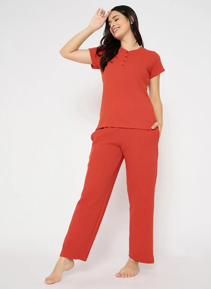 Clovia Clovia Chic Basic T-shirt & Pyjama Set in Brick Red - Waffle