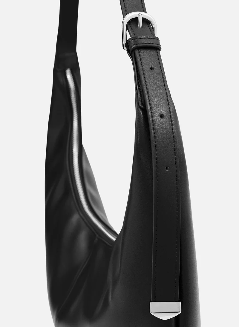 ليتشي حقيبة نصف دائرية بحزام كتف طويل