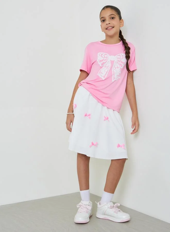 ستايلي Teens Pink Bow T-Shirt And Knee Length Skirt Set