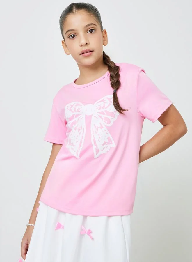 ستايلي Teens Pink Bow T-Shirt And Knee Length Skirt Set