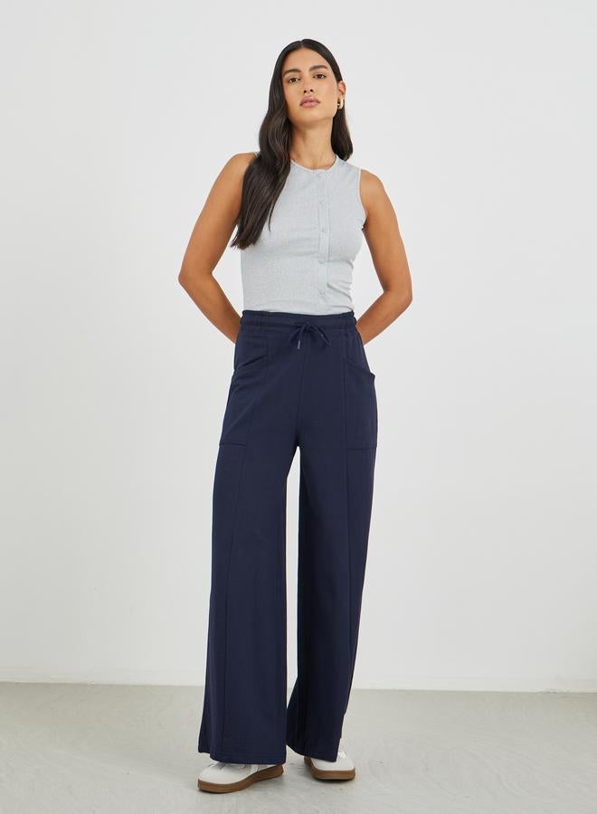 Styli Styli Solid Cut and Sew Wide Leg Joggers - Image 1