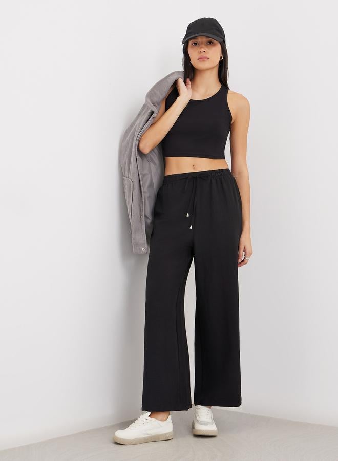 Styli Solid Drawstring Waist Wide Leg Pants - Image 1