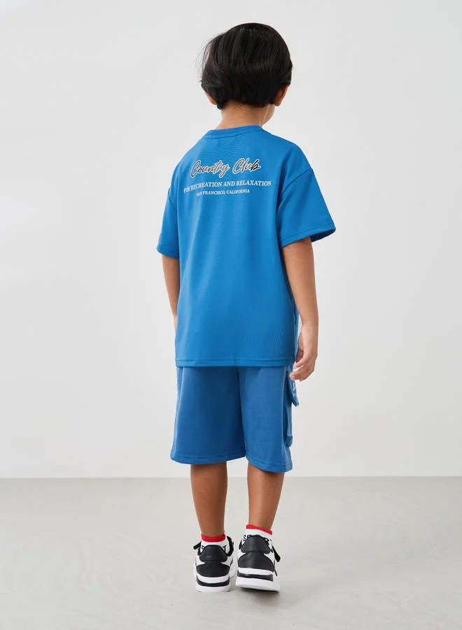 Styli Styli Boys Typography Printed Oversized T-Shirt and Shorts Set
