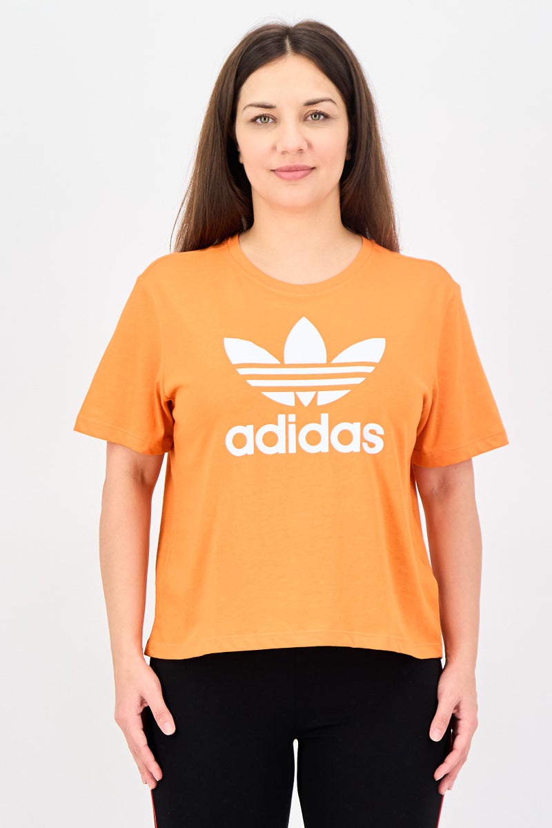 adidas Originals Women Loose Fit Short Sleeve Outdoor T-Shirt, Orange - Image 1