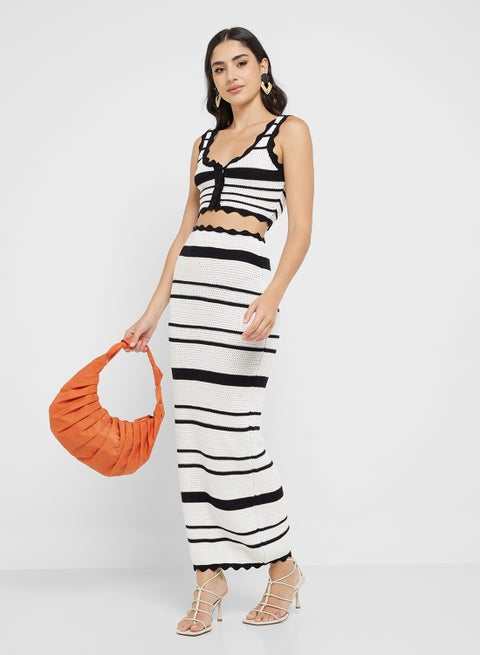 طقم كروشيه بلون واحد مع تنورة