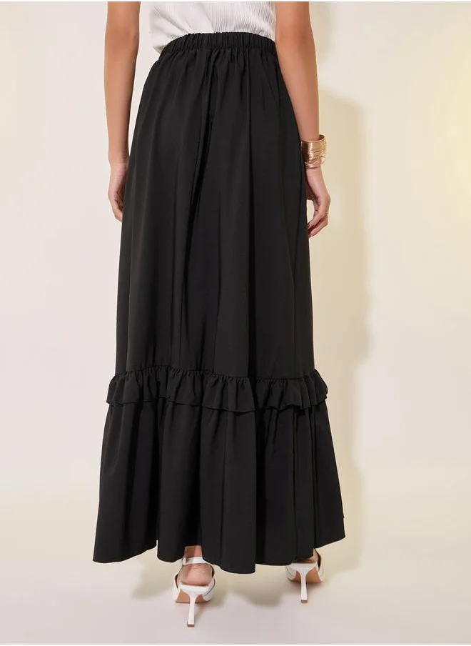 Styli Solid Ruffled Hem A-Line Maxi Skirt